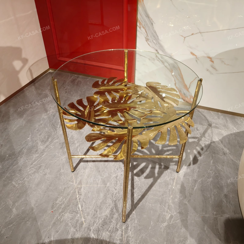 Sculptural Round Glass Sofa Side Table with Gold-Finished Leaf Detail and Textured Metal Frame